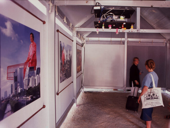 Manit Sriwanichpoom at Thailand’s inaugural Pavilion in 2003. Exhibition View of 'Hungry Ghost', 2003, Manit Sriwanichpoom. Image courtesy of the artist.